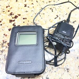 Creative Nomad Jukebox Zen 30GB MP3 Player with downloaded songs. Belt clip case